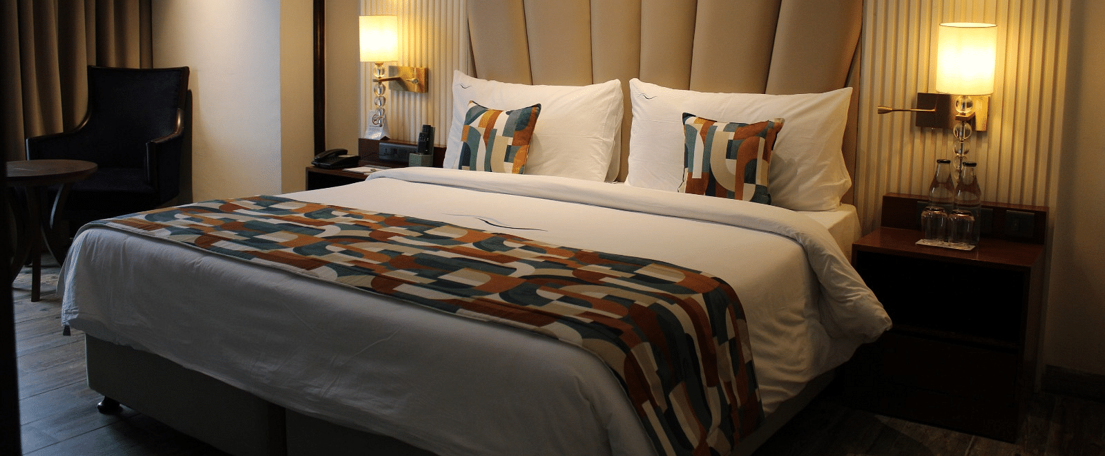 A bedroom featuring a functional working space for productivity at BluSalzz Residence, Amritsar